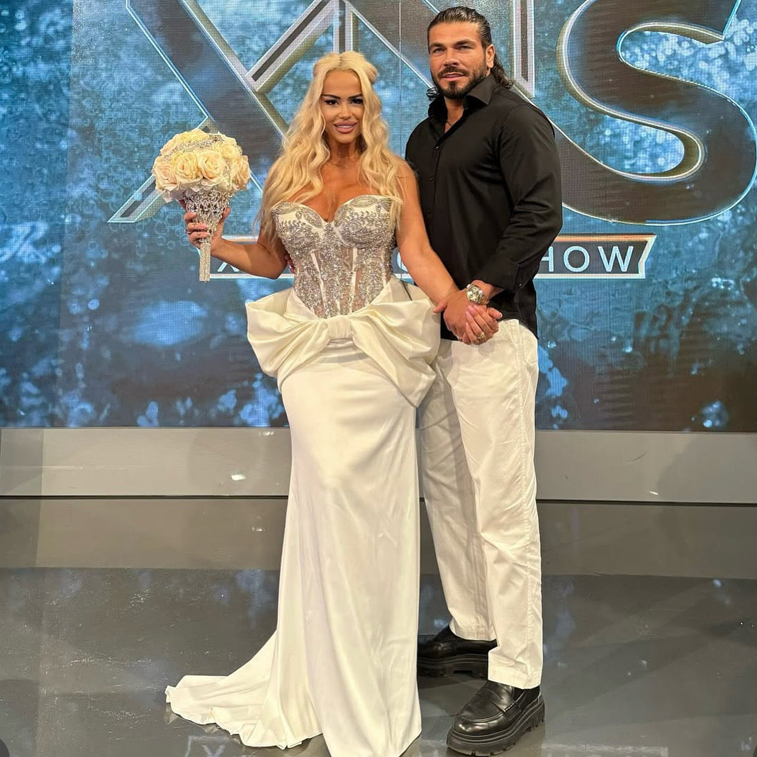 Bridal Gown with Handmade Corset and Statement Bow – A Gift of Love in Dress Form